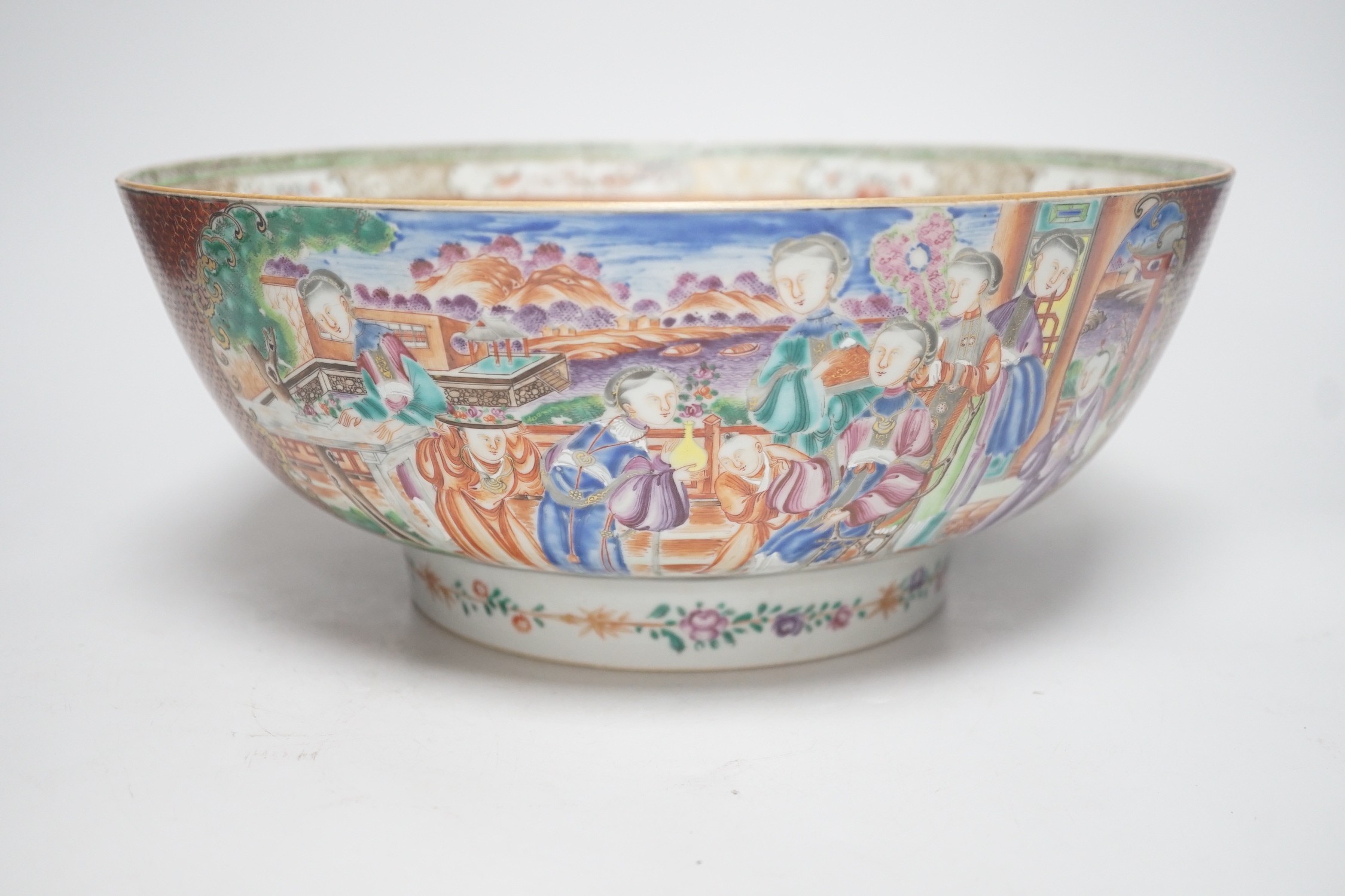 An 18th century Chinese export famille rose ‘mandarin’ punch bowl, 31cm diameter (af)